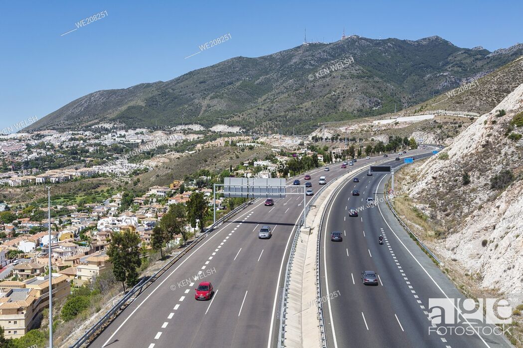 Stock Photo: Aerial view of A-7, E-15 motorway. Costa del Sol, Malaga Province, Spain. The town to the left is Arroyo de la Miel.