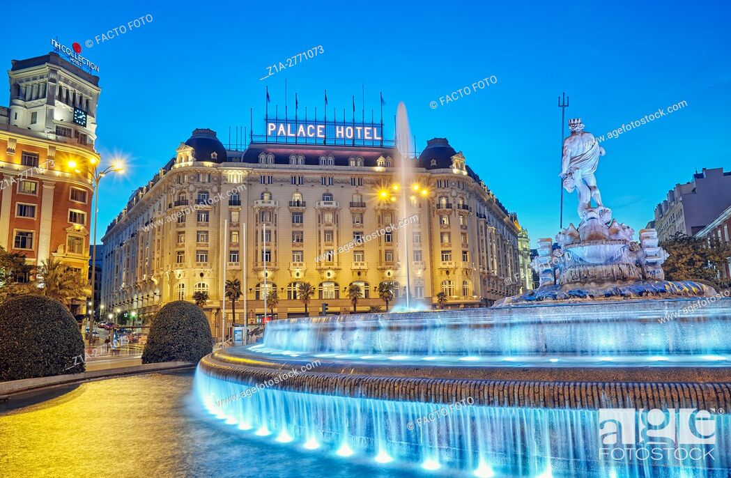 Stock Photo: Neptune fountain and the Palace hotel, located at the Paseo del Prado boulevard. Madrid, Spain.