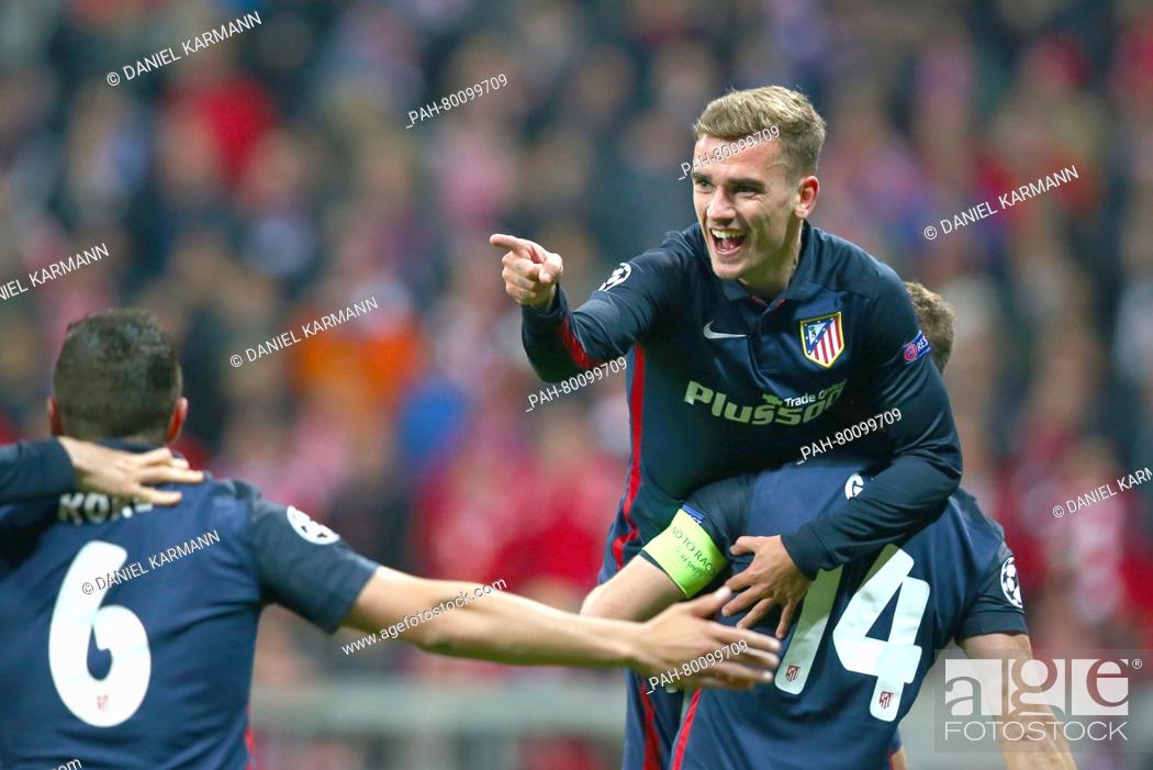 Stock Photo: Madrids Antoine Griezmann (M) celebrates scoring his first goal during the Champions League semi-final second leg soccer match between Bayern Munich and.