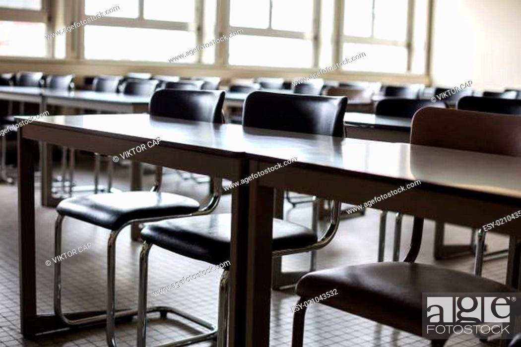 Stock Photo: Empty classroom with chairs and desks.