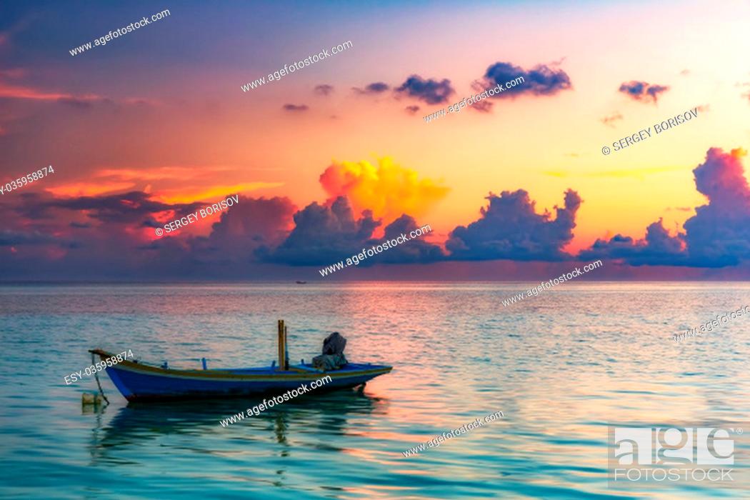 Stock Photo: Calm sunrise over ocean on Maldives.