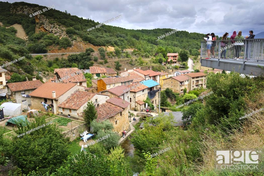 Stock Photo: Village general view and people in a viewpoint. Tobera. Frias, Burgos, Castilla y Leon, España.