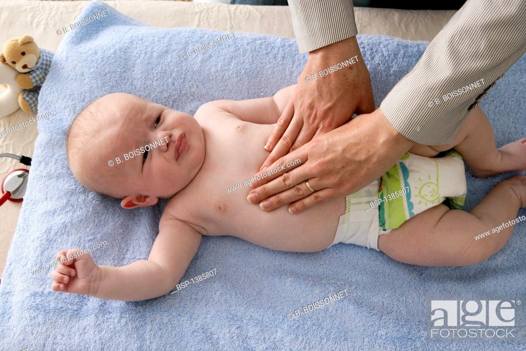 Stock Photo: ABDOMEN SEMIOLOGY INFANT Models. 3-month-old baby boy.