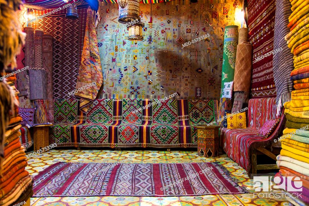 Stock Photo: Different color and textures carpets in a Moroccan shop in Chefchaouen, April 2018.