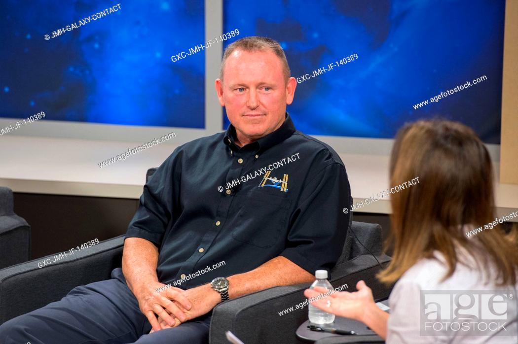 Stock Photo: NASA astronaut Barry Wilmore, Expedition 41 flight engineer and Expedition 42 commander, and Public Affairs Office moderator Nicole Cloutier are pictured during.