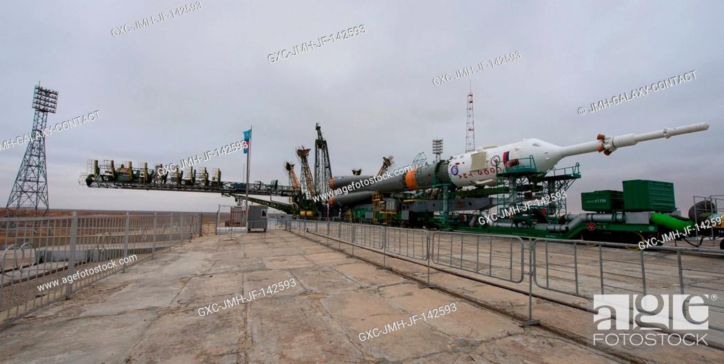 Stock Photo: The Soyuz TMA-20M spacecraft is seen at the launch pad after being rolled out by train in the early hours of Wednesday, March 16.