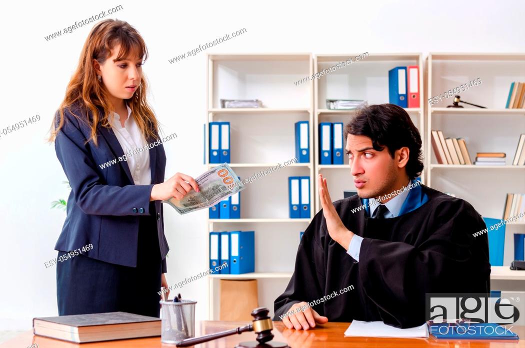 Stock Photo: Young woman visiting male lawyer.