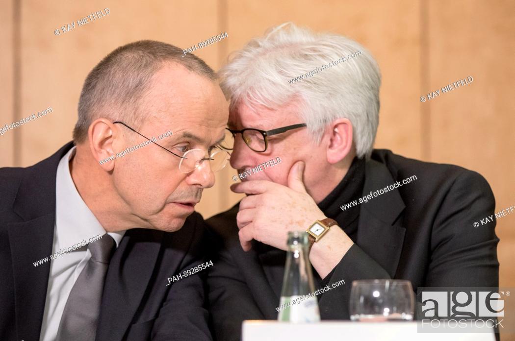 Stock Photo: Guenter Lubitz, father of the Germanwings co-pilot of the plane crash in the Alps, talks to spokesman Hans-Joachim Rüdel (r) during a press conference in Berlin.