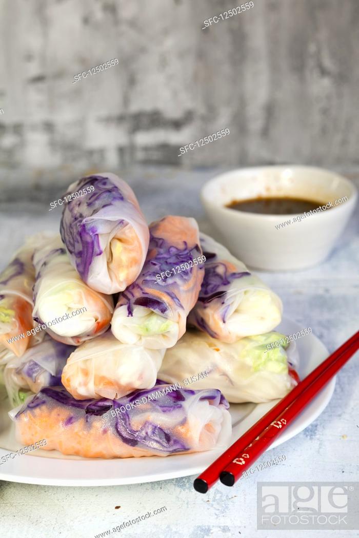 Stock Photo: Vegan summer rolls with a spicy chili dip.