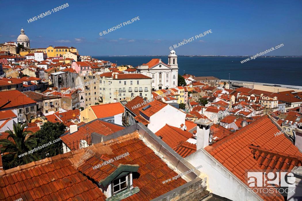 Stock Photo: Portugal, Lisbon, view over the roofs of Alfama district, St. Vincent de Fora monastery (Igreja de Sao Vicente de Fora), St Etienne church (Santo Estevao) and.