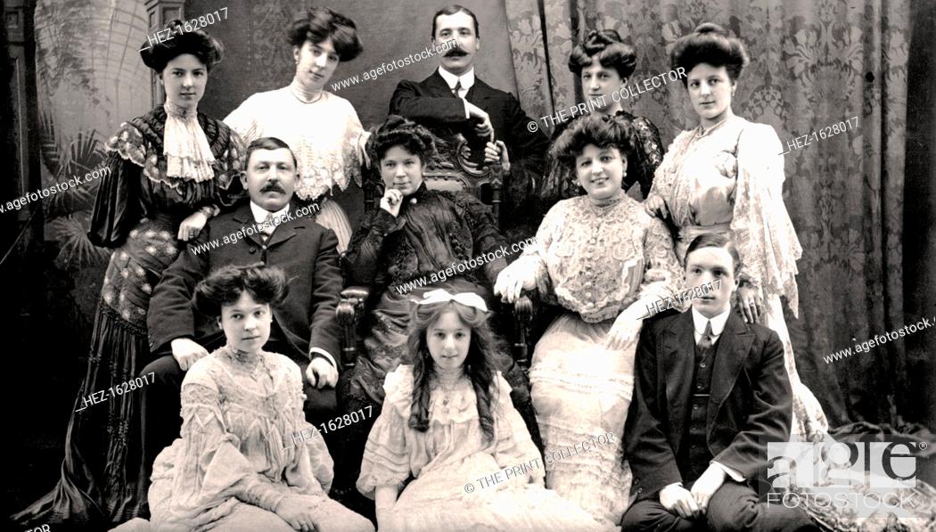 Stock Photo: The Lloyd Family, early 20th century. From the back to the front, left to right: Daisy, Rosie, John, Grace, Alice, Father, Mother, Marie, Annie, Maud, Sidney.