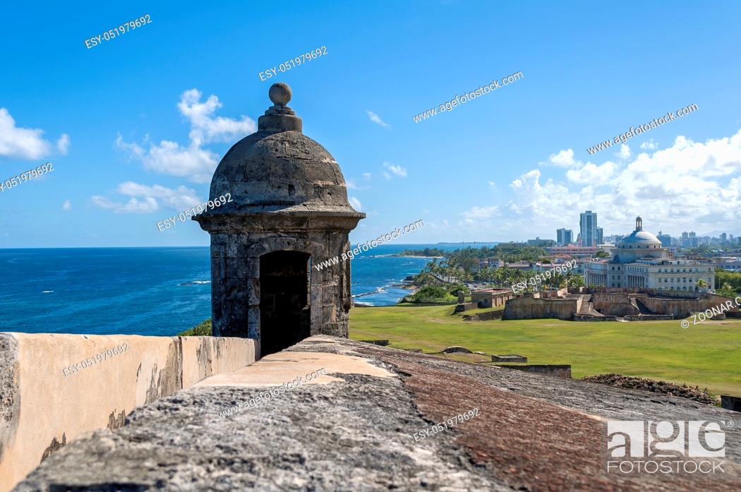 Stock Photo: Observation tower at the Castillo de San Cristobal, with Capitol building in the background, San Juan, Puerto Rico.