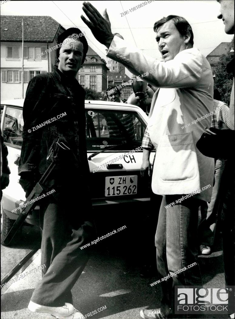 Stock Photo: Aug. 30, 1981 - Explaining the action: French movie director Yves movie director Yves Boisset explains the action to unidentified actor during the shooting of.
