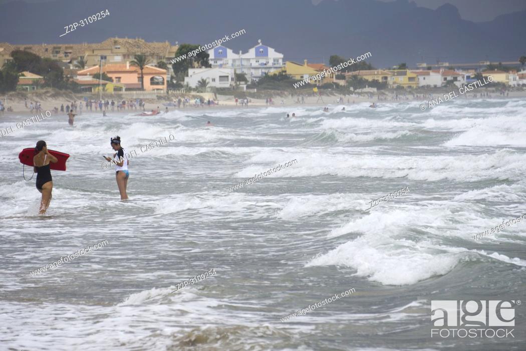 Stock Photo: DENIA. Spain: Beach under stormy sky La Almadraba.Alicante.