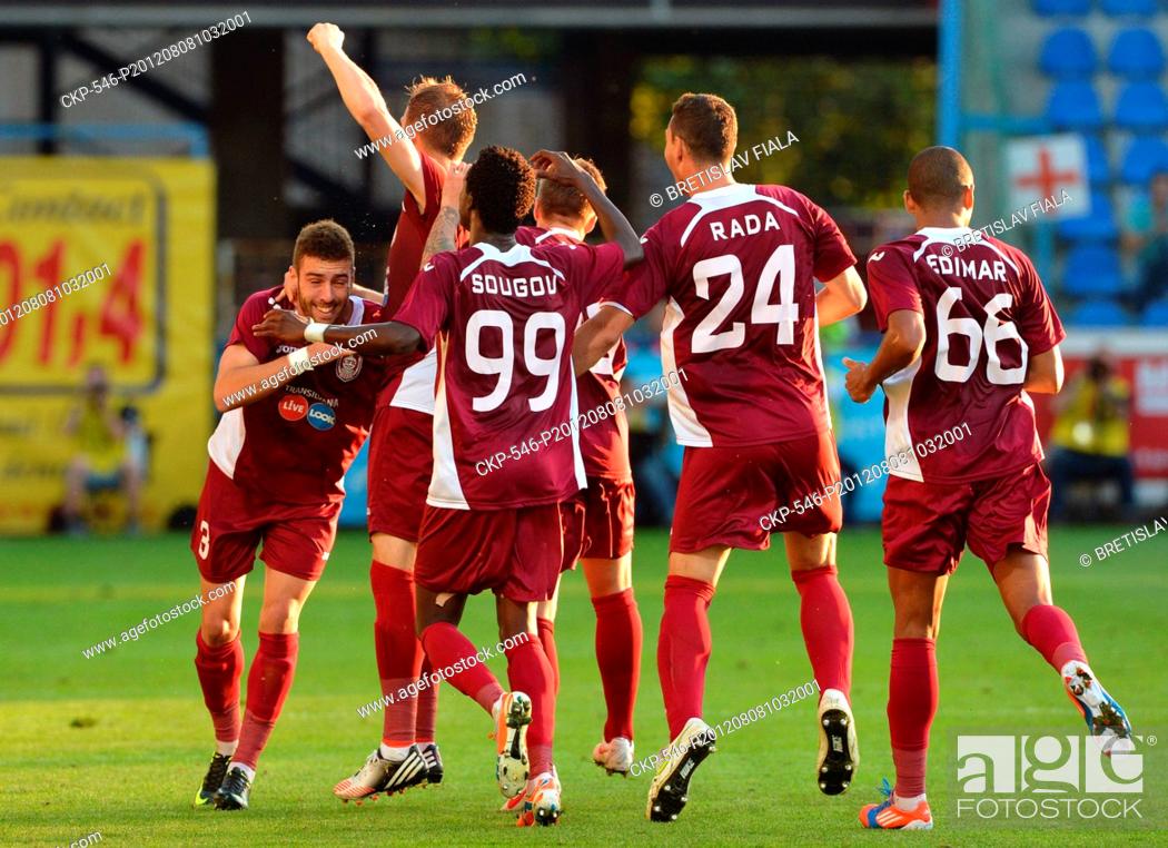 Stock Photo: Players of CFR Cluj celebrate scoring goal during return match of the UEFA Champions League Qualifiers 3rd round Slovan Liberec vs CFR Cluj in Liberec.