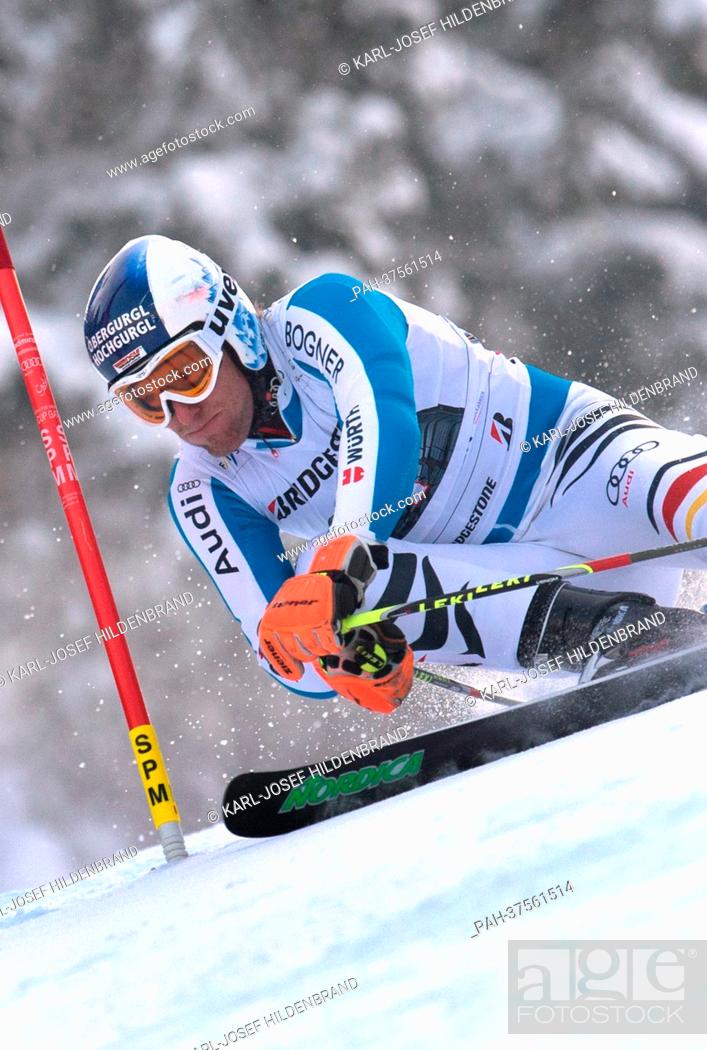 Stock Photo: Germany's Fritz Dopfer speeds down the slope during the first run of the Men's Giant Slalom race at the Alpine Skiing World Cup in Garmisch-Partenkirchen.
