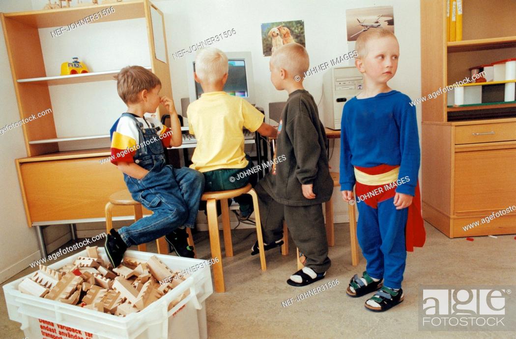 Stock Photo: Color Image, Horizontal, Costume, Friendship, Boy, Indoors, Three, Toy, Serious, Computer, Disguise, Expression, Several, Relation, Sweden, Two, Swedish, Playmate, Hero, Catalogue, Scandinavia, Preschool, Masquerade, Superman, Interior Decoration, Interior Design, Elementary Age, Video Game, Four People, Children Only