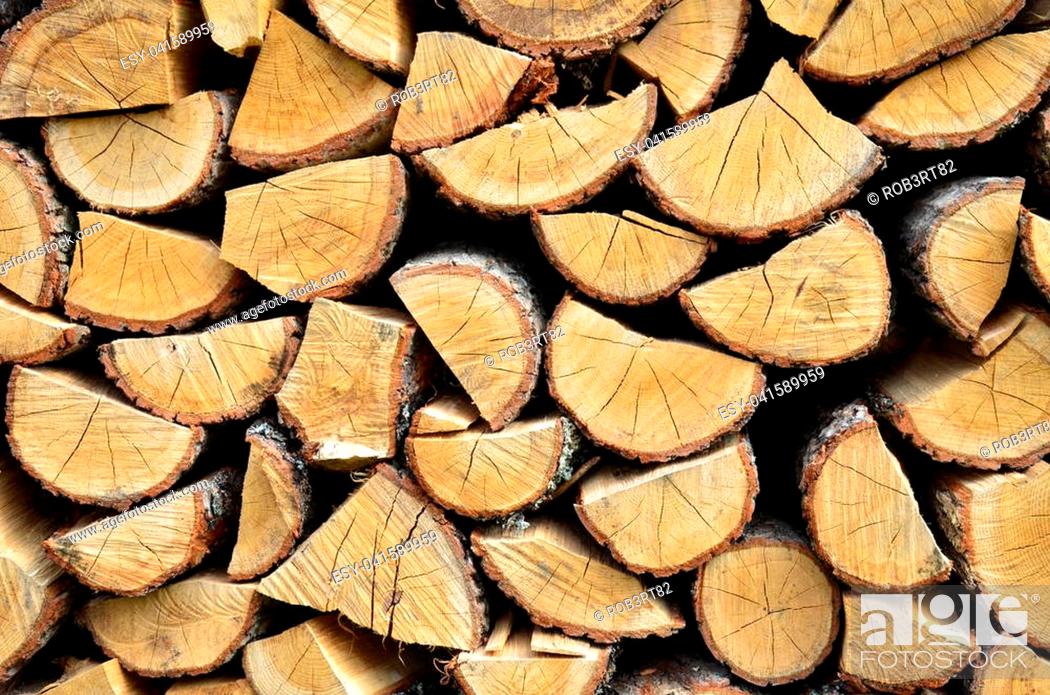 Stock Photo: Dry chopped firewood logs ready for winter.