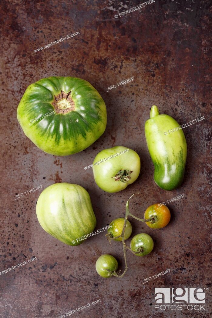 Stock Photo: Assorted types of green tomatoes.