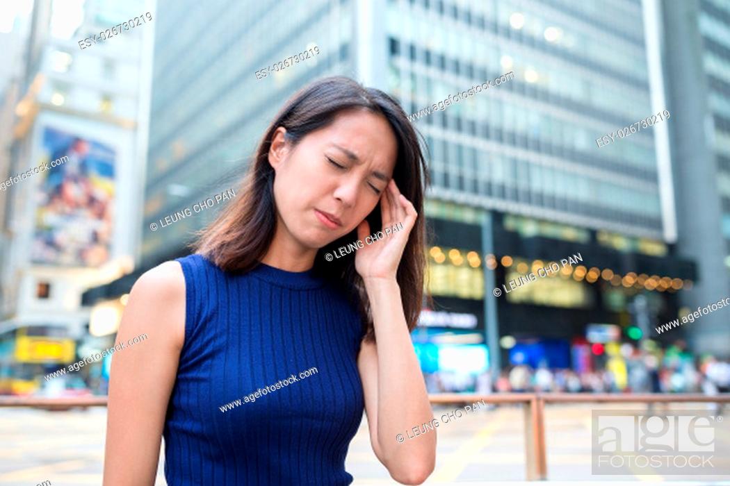 Stock Photo: Woman suffer from headache.