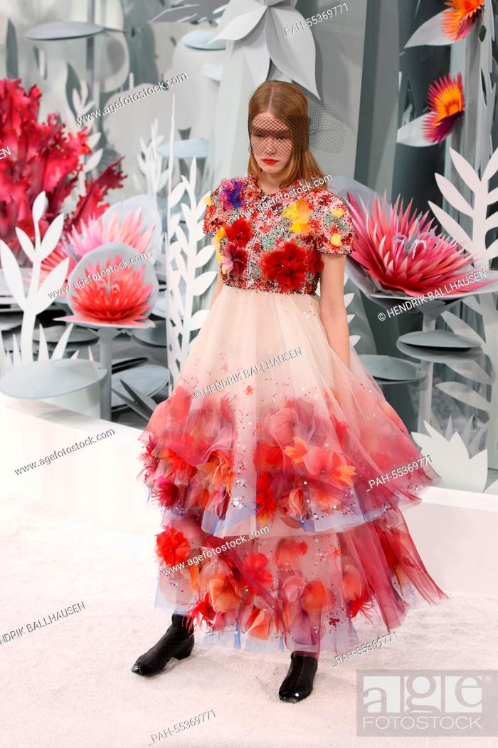 A model wears a creation by German designer Karl Lagerfeld as part of Chanel  spring/summer 2015, Stock Photo, Picture And Rights Managed Image. Pic.  PAH-55369771