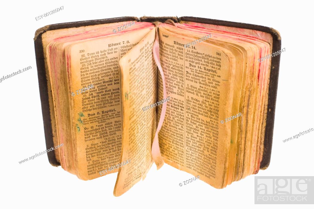 Stock Photo: Old gothic antique vintage open bible with bookmark isolated on white background with cliping path.