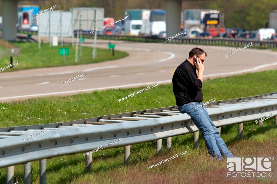 Stock Photo: DRONTEN, FLEVOLAND, HOLLAND-APRIL 24: A truck colliding with a large brigde in the highway A6 has caused a large traffic jam on April 24, 2012 at Dronten.