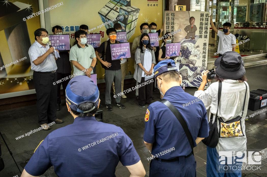 Stock Photo: Economic Democratic Alliance hold a protest in front of Chang Hwa Bank in Taipei, Taiwan on 13/09/2022 Protesters denounce low-interest loans provided by.