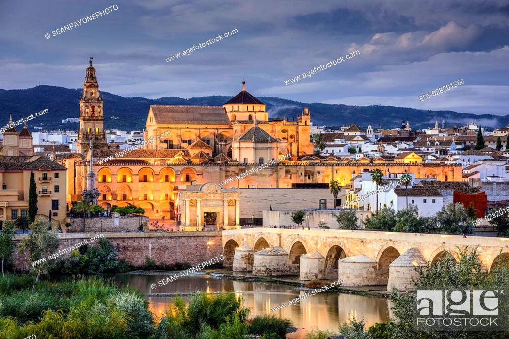 Stock Photo: Cordoba, Spain at the Roman Bridge and Town Skyline on the Guadalquivir River.