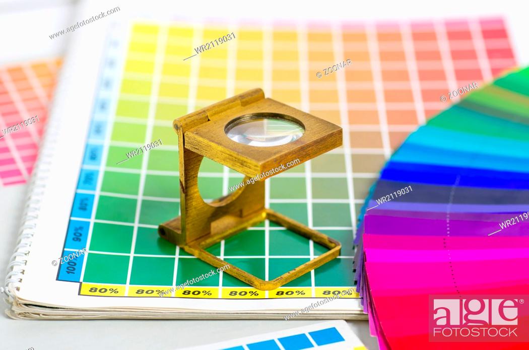 Photo de stock: color guide and color fan with linen tester.