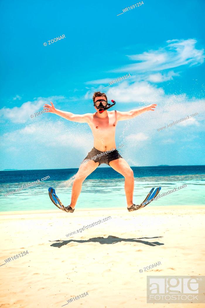 Funny man jumping in flippers and mask, Stock Photo, Picture And Royalty  Free Image. Pic. WR1691254 | agefotostock