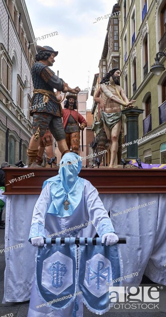 Stock Photo: Brotherhood of the Penitential of Our Father Jesus tied to the Column in the General Procession of the Sacred Passion of the Redeemer.