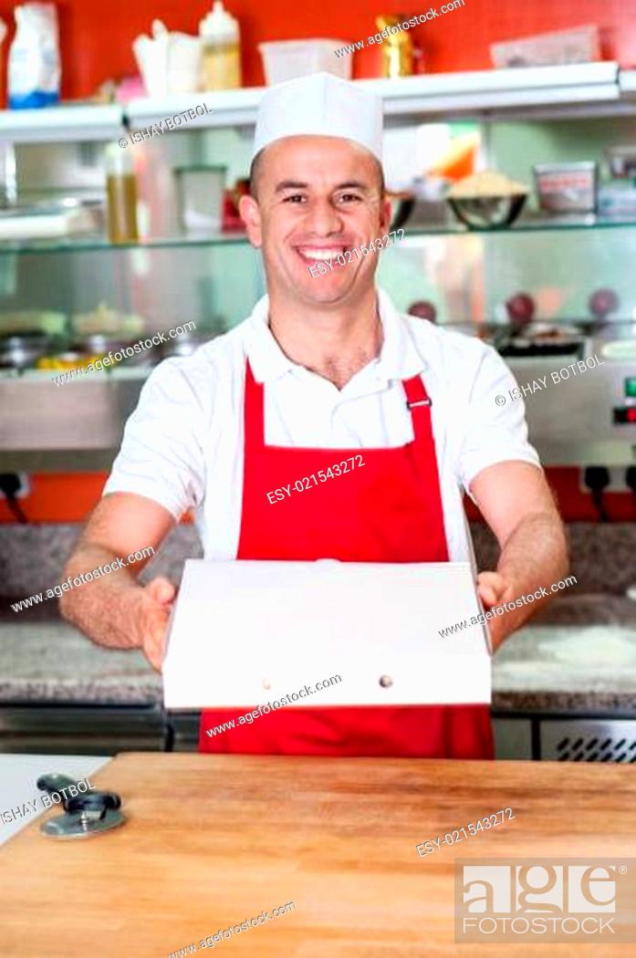 Stock Photo: Here is the pizza you ordered!.