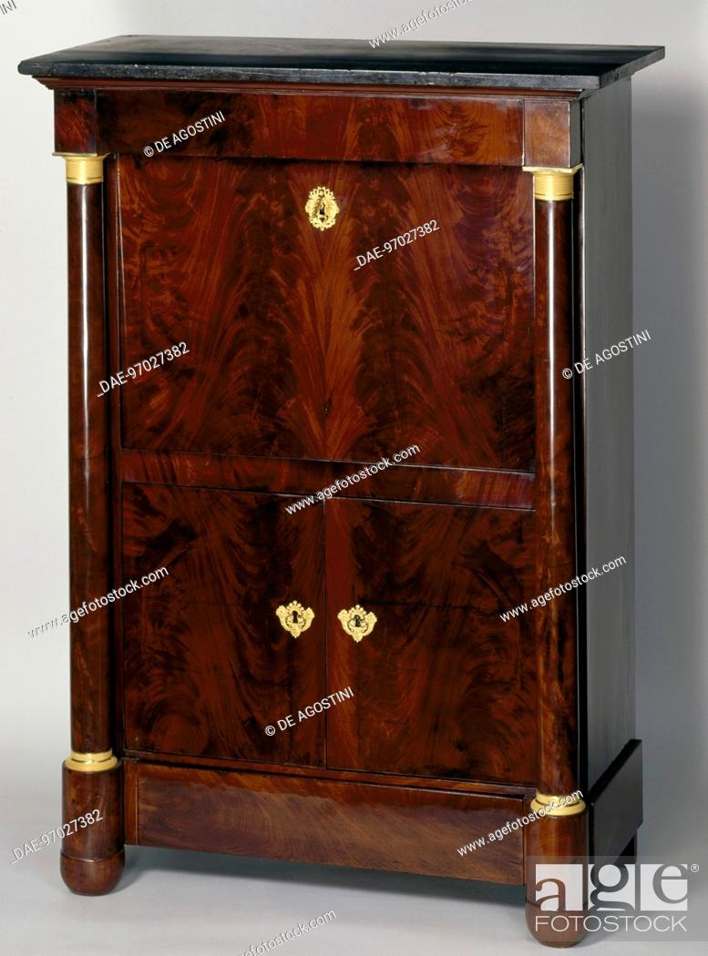 Stock Photo: Empire style flamed mahogany secretary with chiselled and gilt bronze decoration. France, 19th century.  Private Collection.