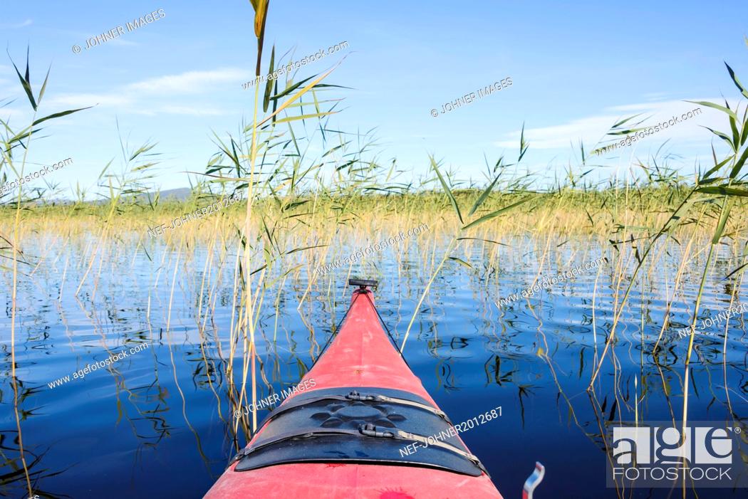 Stock Photo: Kayak bow on lake.