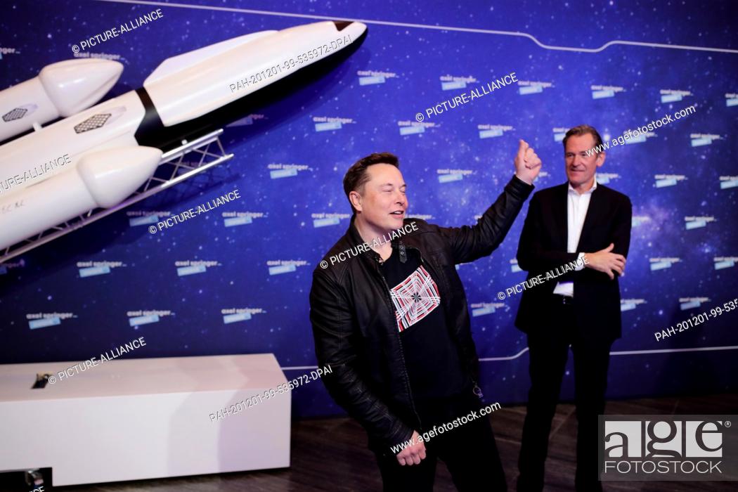 Stock Photo: 01 December 2020, Berlin: Elon Musk (l), head of the space company SpaceX and Tesla CEO, and Mathias Döpfner, CEO of Axel Springer SE.