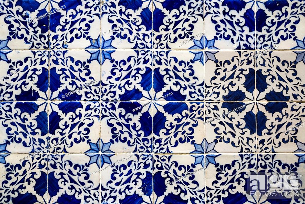 Stock Photo: Traditional tiles on a building facade in Lisbon, Portugal.