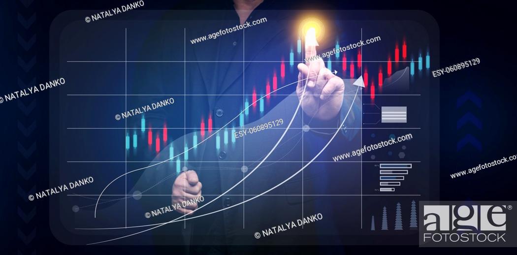 Stock Photo: man in a black shirt stands in front of a holographic graph with growing indicators. Business growth, sales increase. High performance.