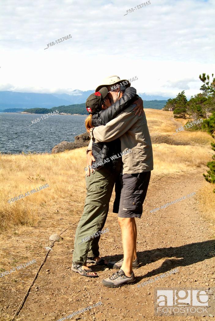 Stock Photo: walkers at Helliwell Park, Hornby Island, Gulf Islands, BC, Canada.