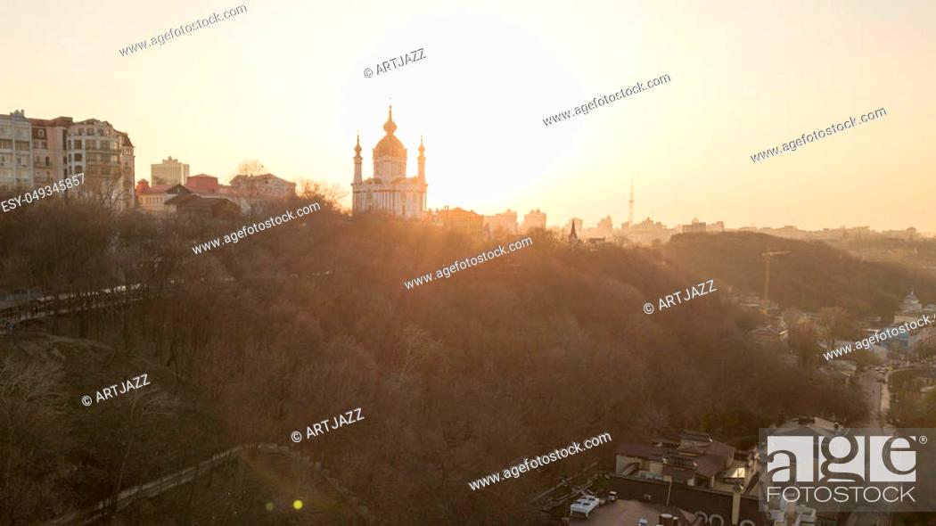 Stock Photo: Skyline bird eye aerial view of the old part of the city Saint Andrew's church under sunset sky in Kiev city, Ukraine.