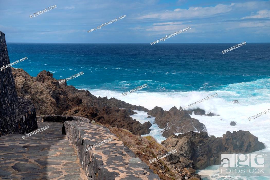 Stock Photo: natural ocean swimming pools on Tenerife island while stormy weather. outdoor shot in Spain. copy space.