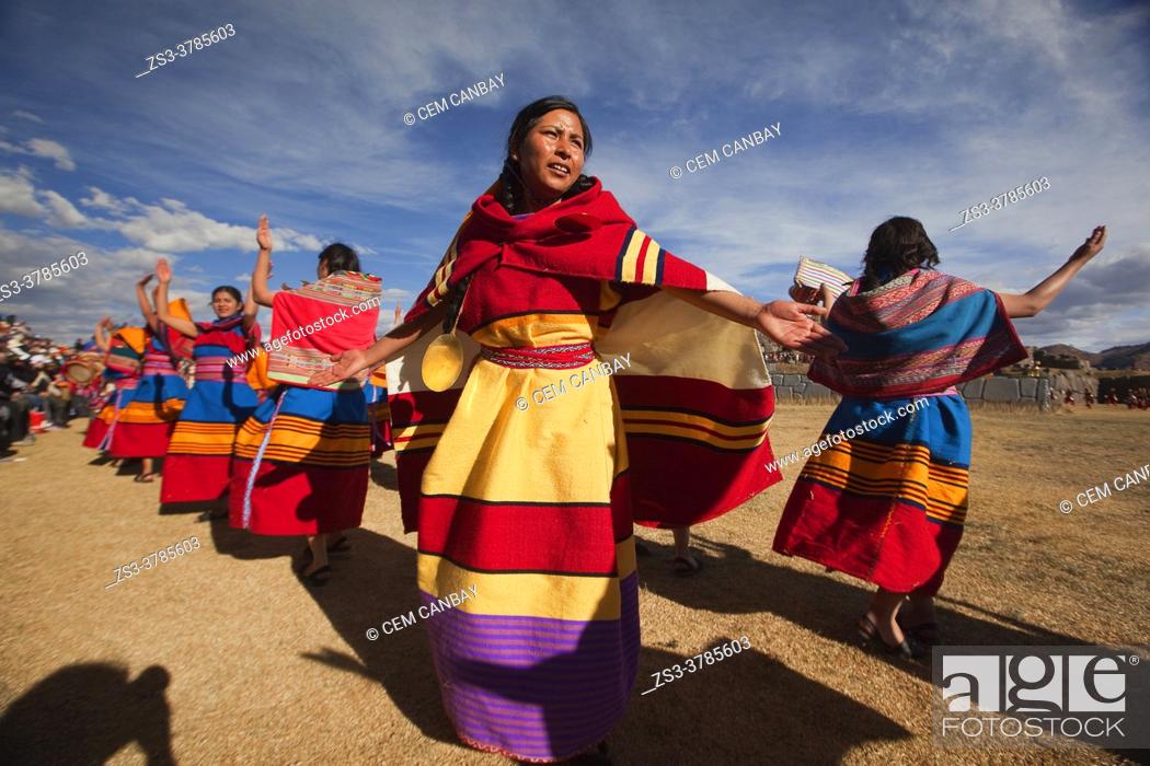 Stock Photo: Indigenous people with traditional costumes during a performance at the Inti Raymi Festival 2018 in Saqsaywaman Archaeological Site, Cusco, Peru, South America.