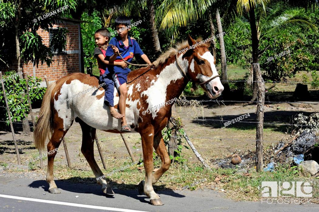 Two Boys Riding On Horseback El Angel Bajo Lempa El Salvador