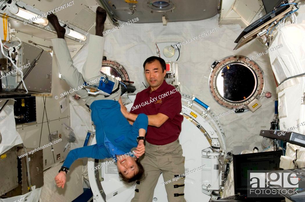 Stock Photo: Marking the first occasion of more than one astronaut representing the Japan Aerospace Space Agency onboard any space vehicle at any time in history.
