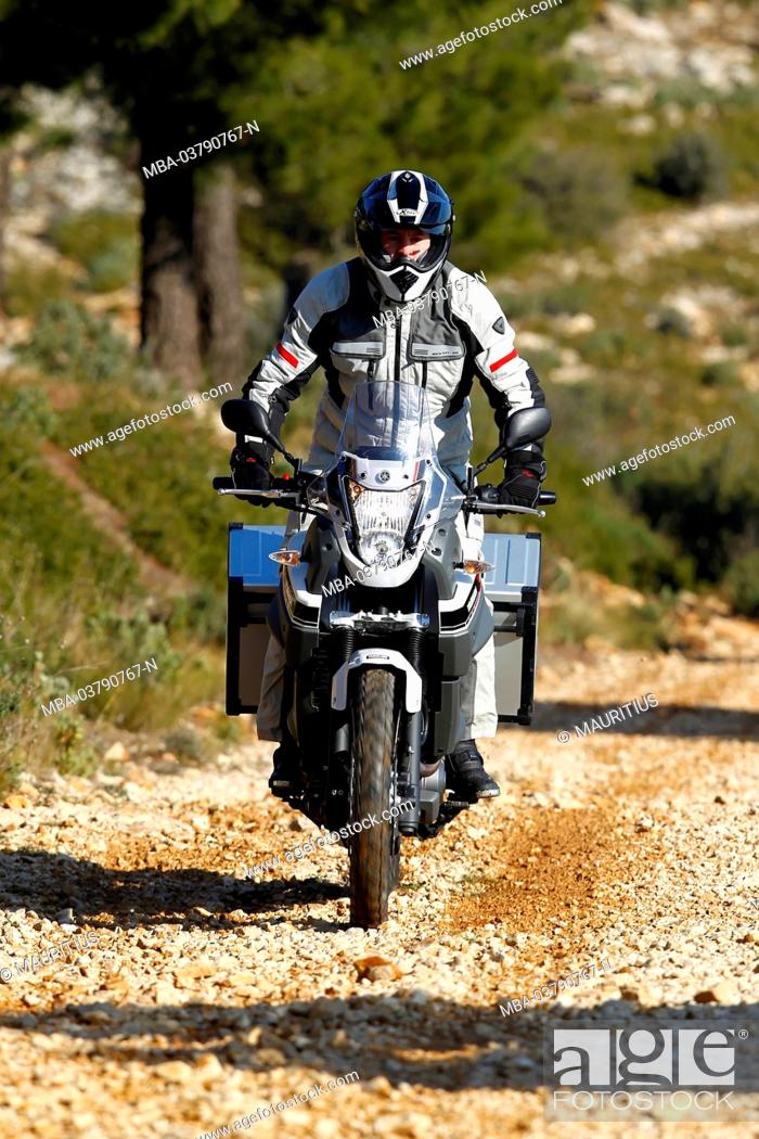 Stock Photo: Motorcycle, single cylinder engine Enduro, Yamaha Tenere on gravel road, Southern France, year of construction in 2012,.
