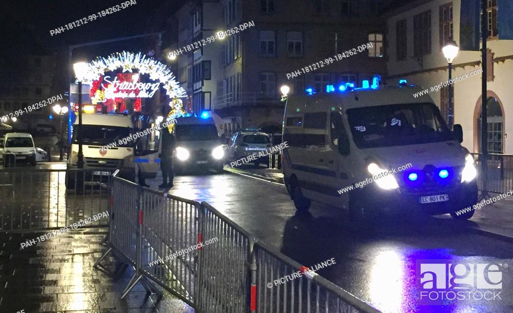 Stock Photo: 11 December 2018, France (France), Straßburg: Entrance Christmas market at the Pont du corbeau is blocked by the police. According to the prefecture.