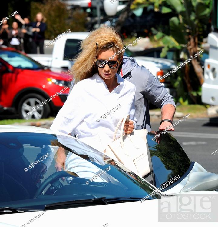 Stock Photo: Iggy Azalea leaves the set of her new music video 'Pretty Girls' wearing a bathrobe, after a day of filming in Studio City Featuring: Iggy Azalea Where: Los.