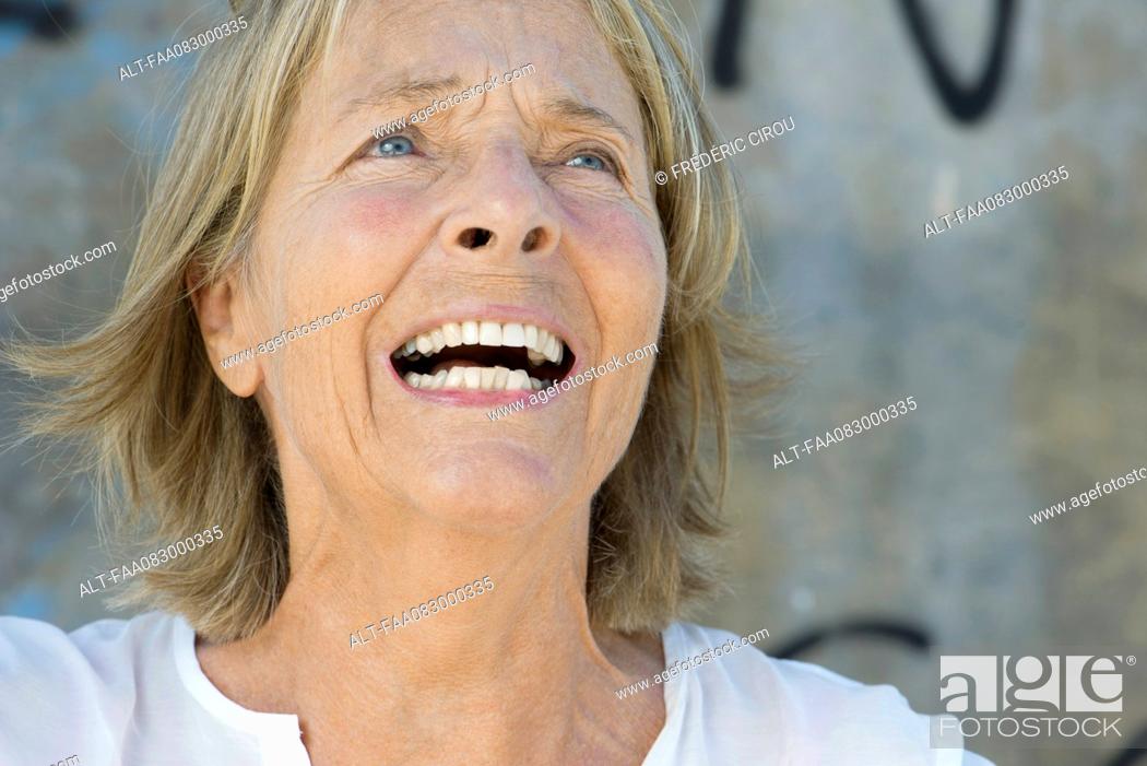 Stock Photo: Senior woman with anguished expression on face.