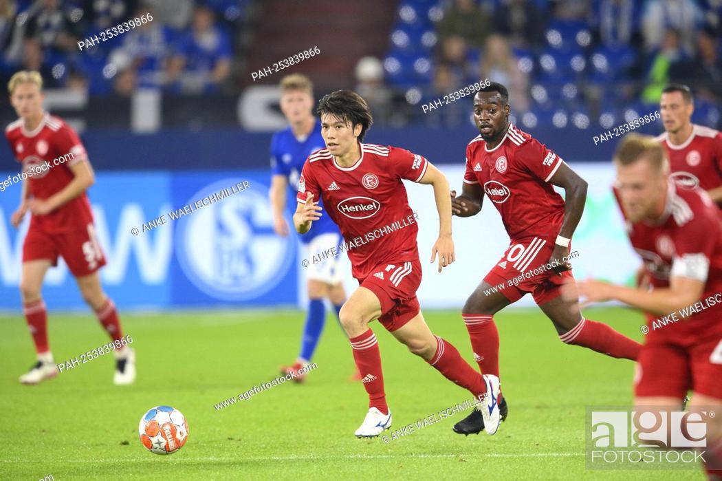 Stock Photo: Ao TANAKA (D) action, r. Khaled NAREY (D) Soccer 2nd Bundesliga, 5th matchday, FC Schalke 04 (GE) - Fortuna Dusseldorf (D).