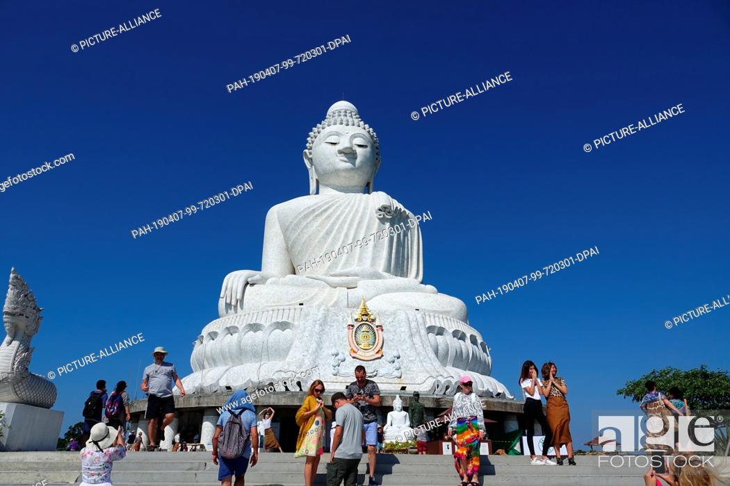 Stock Photo: 28 February 2019, Thailand, Chalong: The Great Buddha of Phuket (Big Buddha, Phra Phuttha Mingmongkhon Akenakkhiri). The Buddha statue stands on the island of.